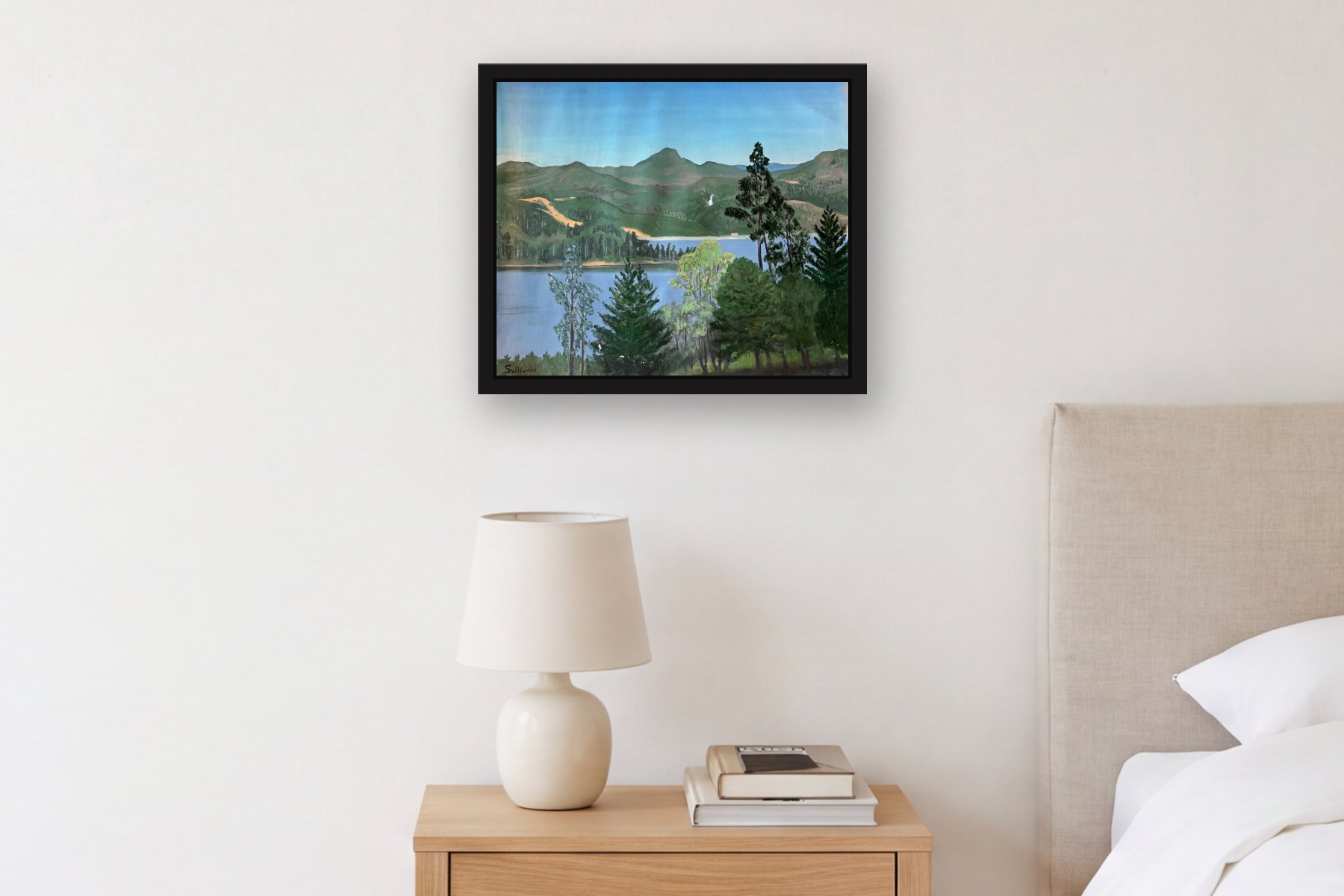 Medellin by Bill Sullivan, hanging above a bedside table in a bedroom