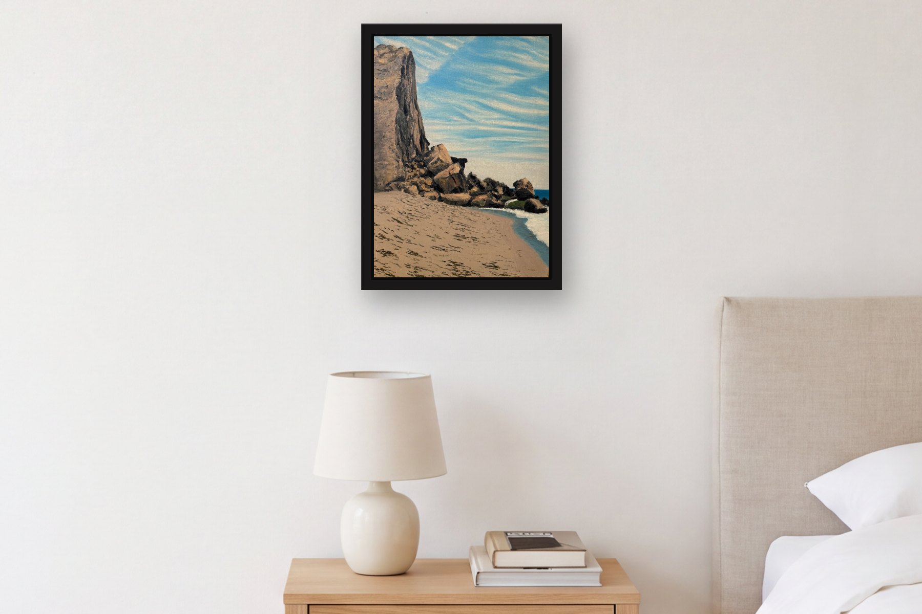 Montauk by Bill Sullivan, hanging above a bedside table in a bedroom