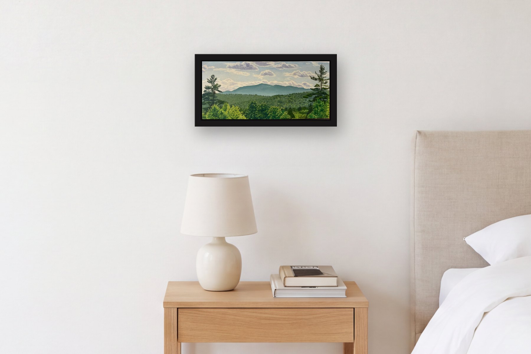 Mountain by Artist not recorded, hanging above a bedside table in a bedroom