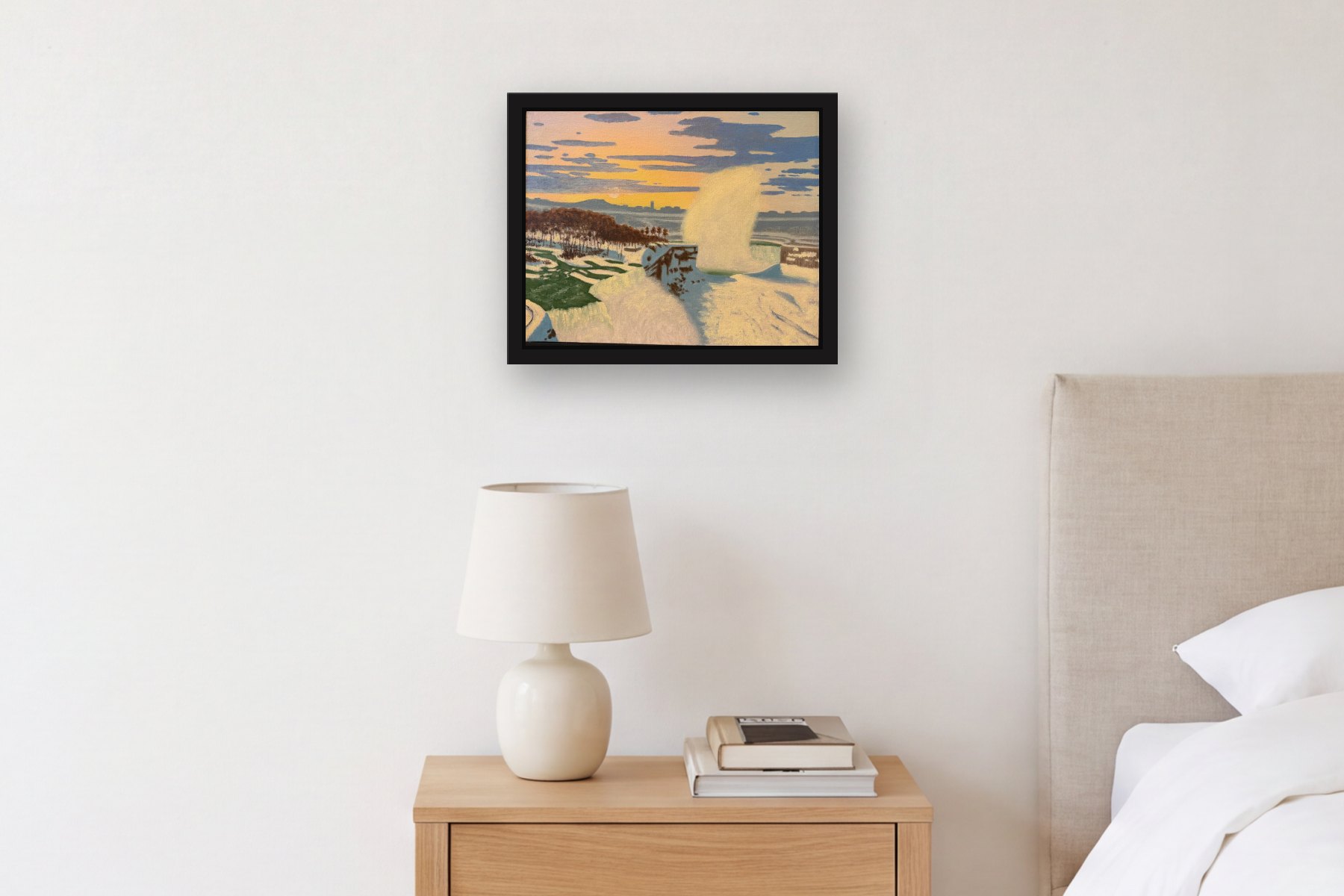 Niagara in the Winter by Bill Sullivan, hanging above a bedside table in a bedroom