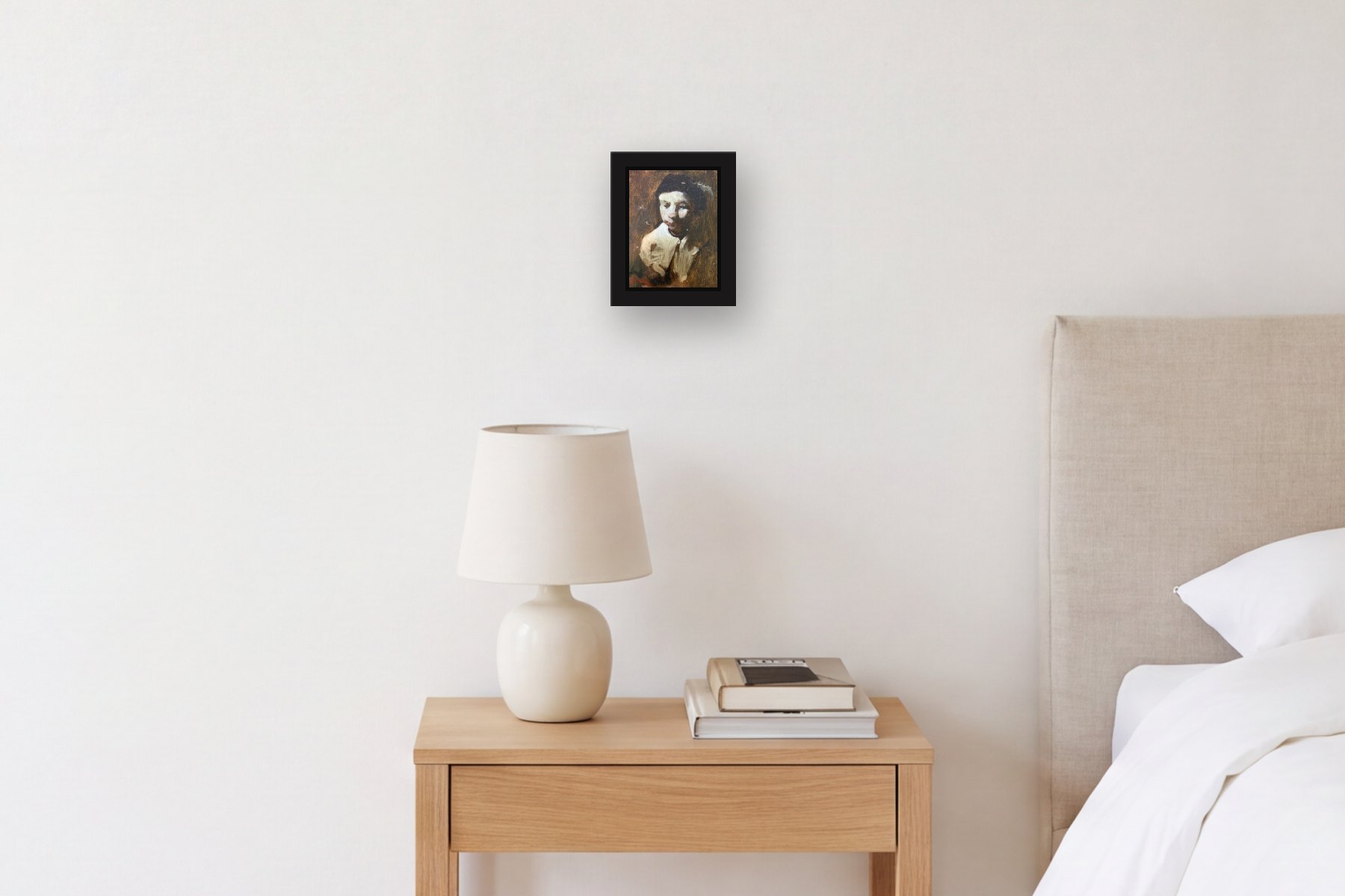 Sad Clown by Jainey Neighbors, hanging above a bedside table in a bedroom