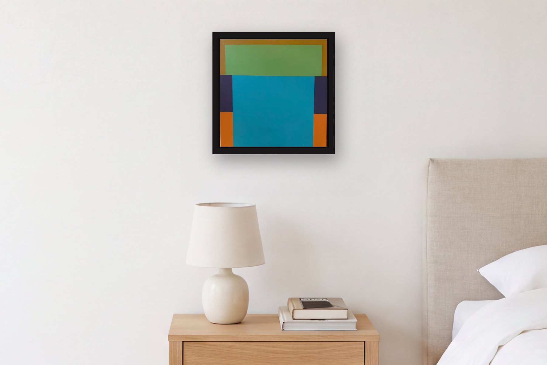 Squares by Bill Sullivan, hanging above a bedside table in a bedroom