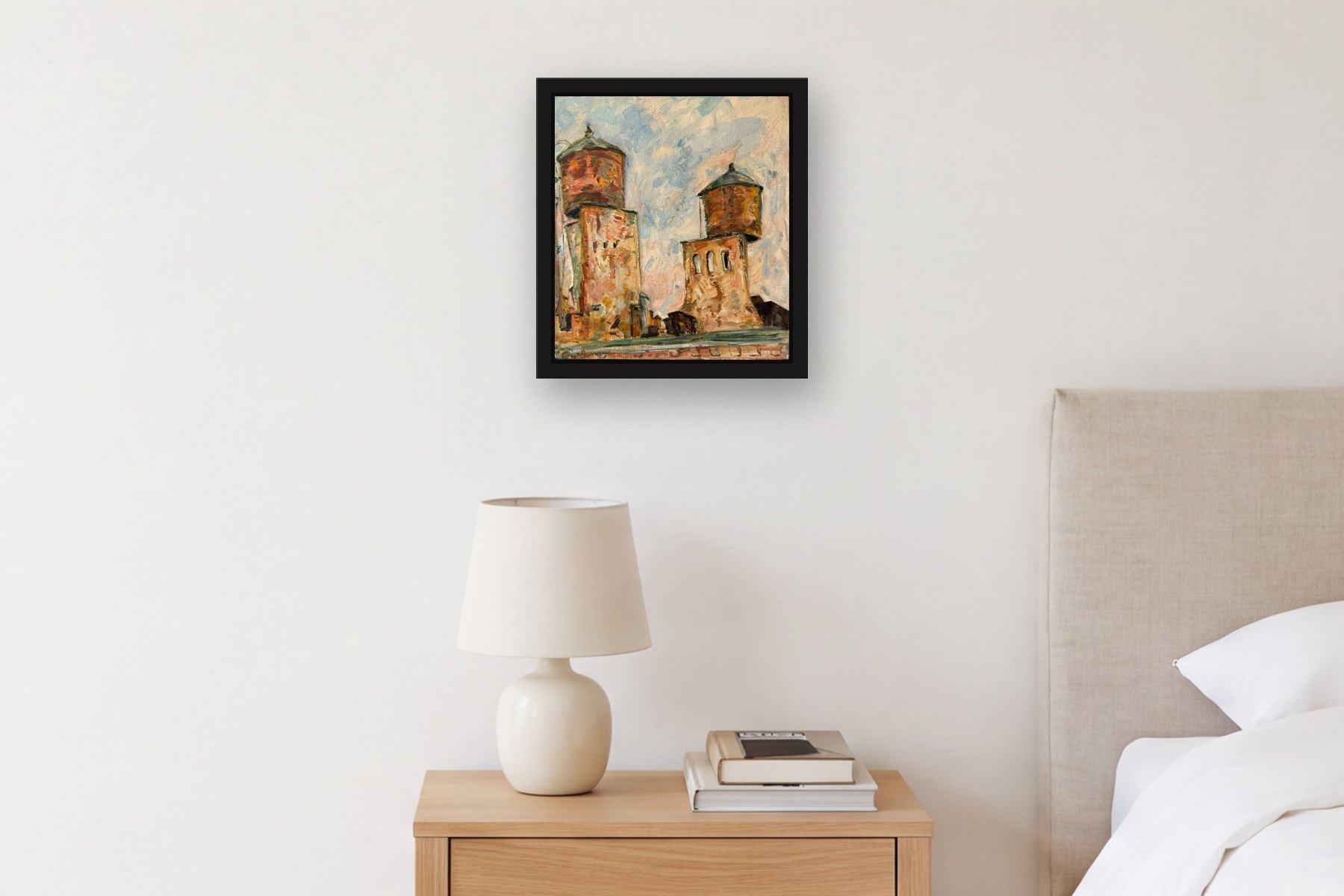 Untitled (Water Tanks) by Artist not recorded, hanging above a bedside table in a bedroom
