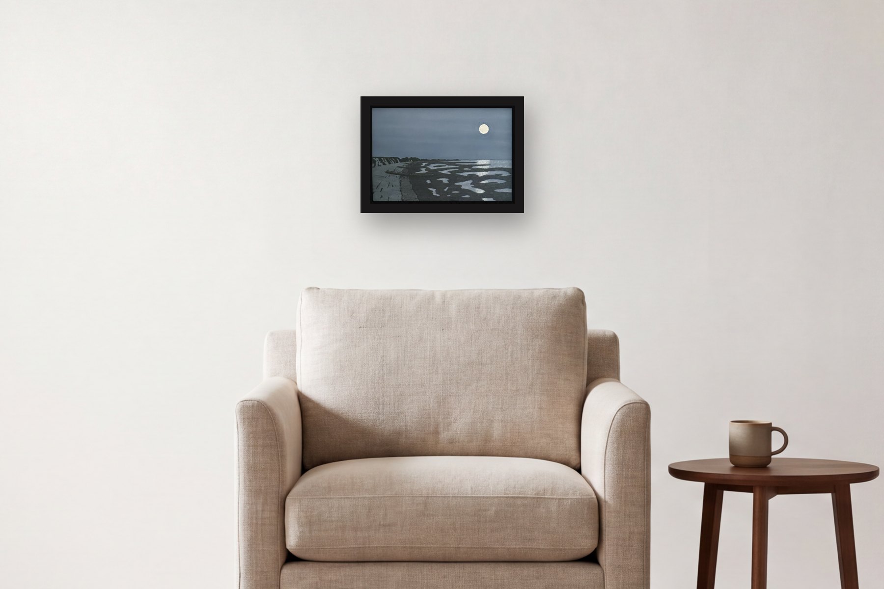 Brewster Beach Night by Bill Sullivan, hanging above an armchair