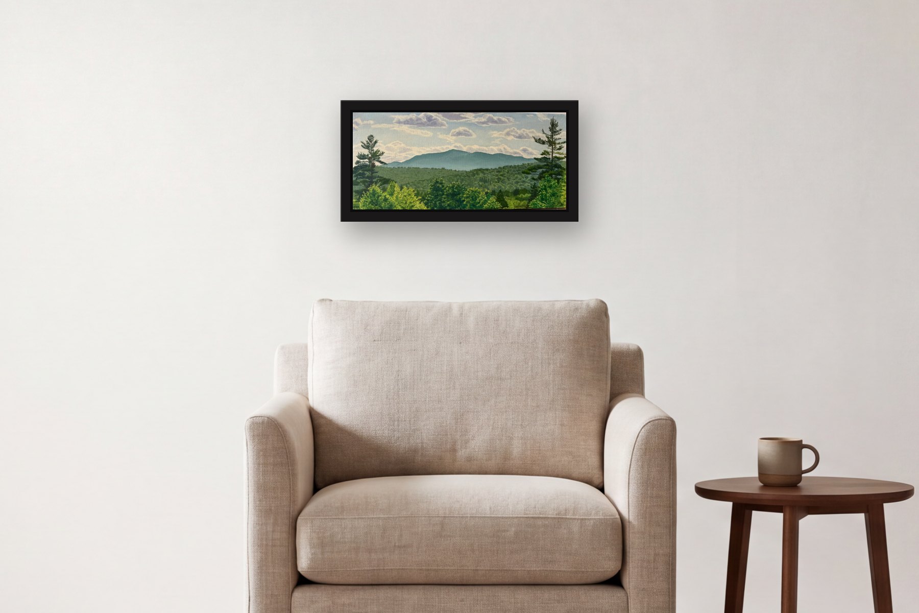 Mountain by Artist not recorded, hanging above an armchair