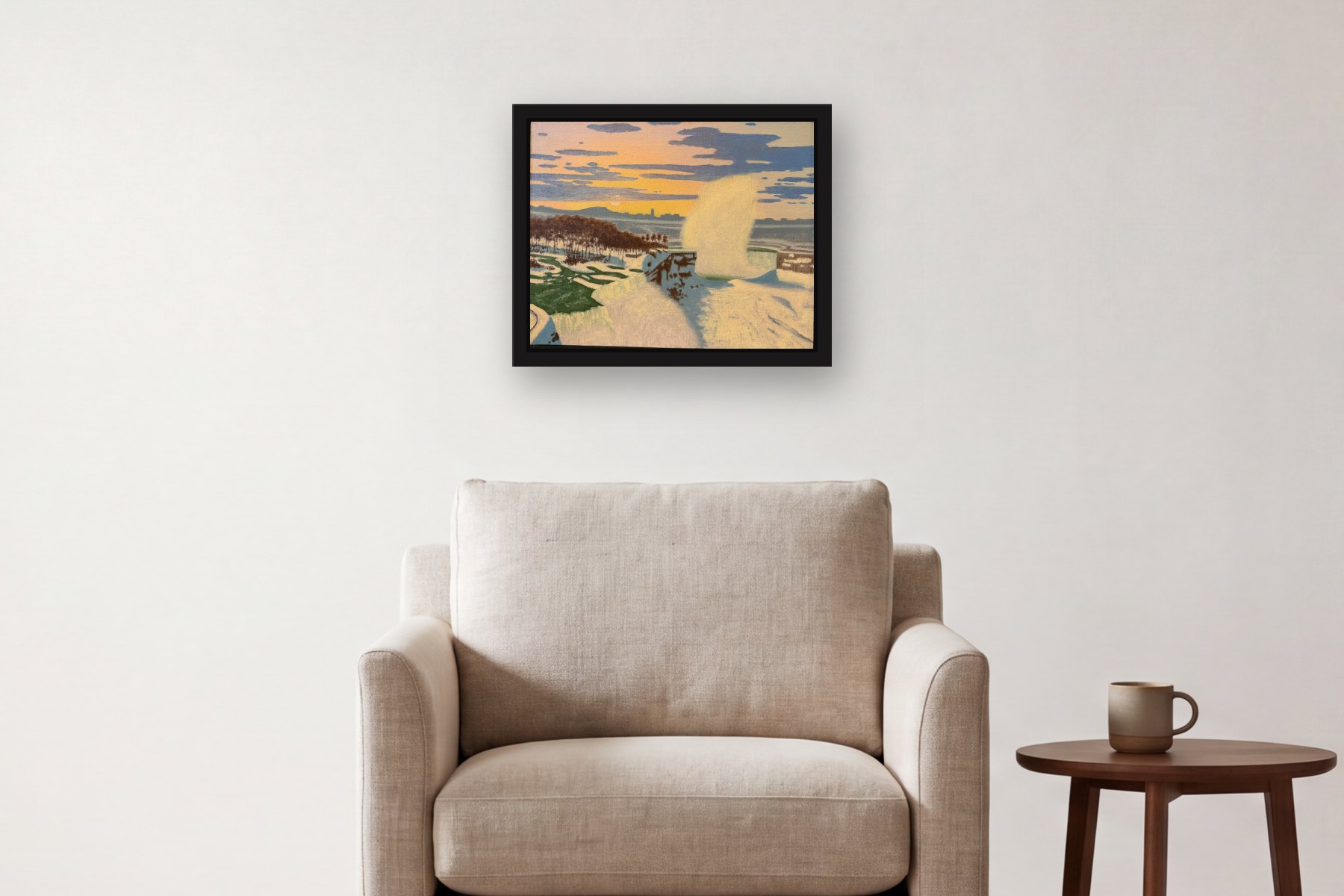 Niagara in the Winter by Bill Sullivan, hanging above an armchair