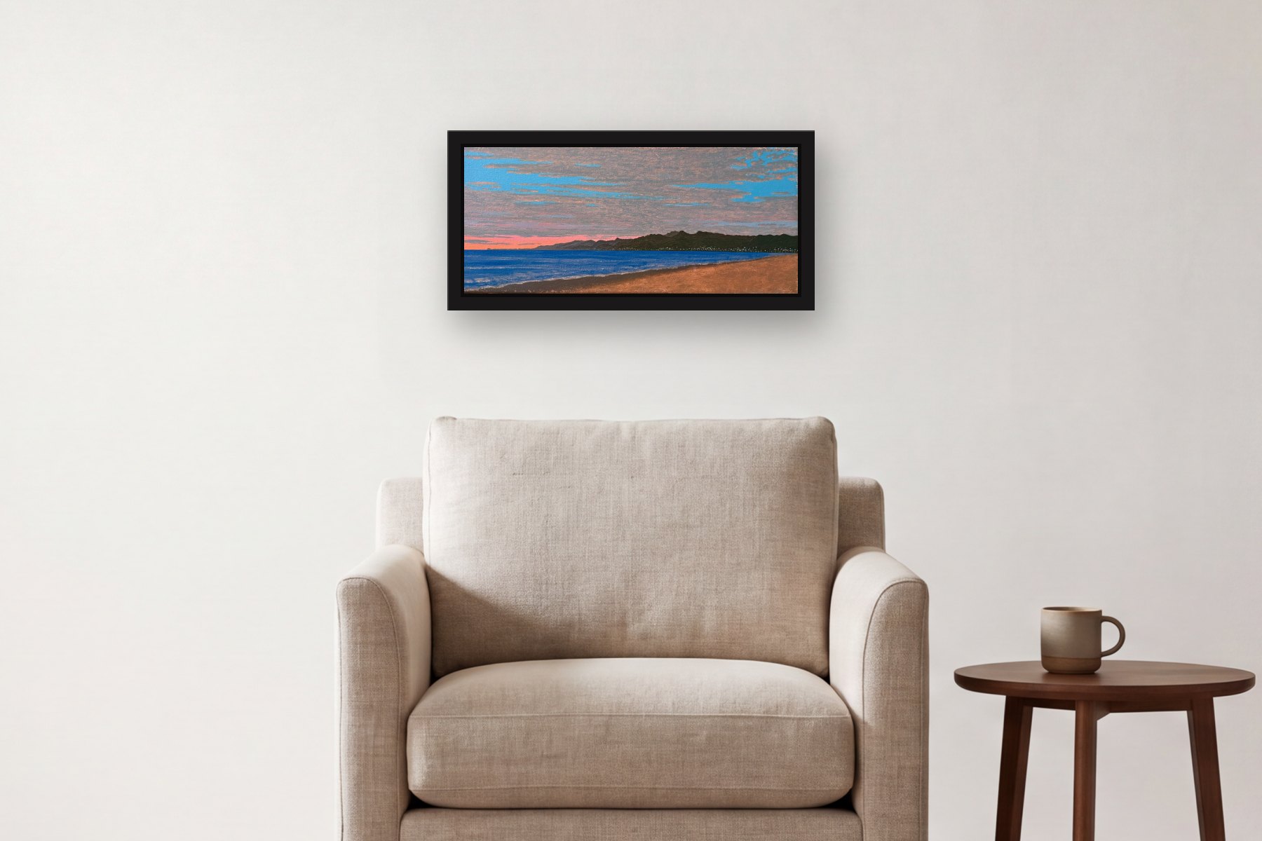 Santa Monica by Bill Sullivan, hanging above an armchair