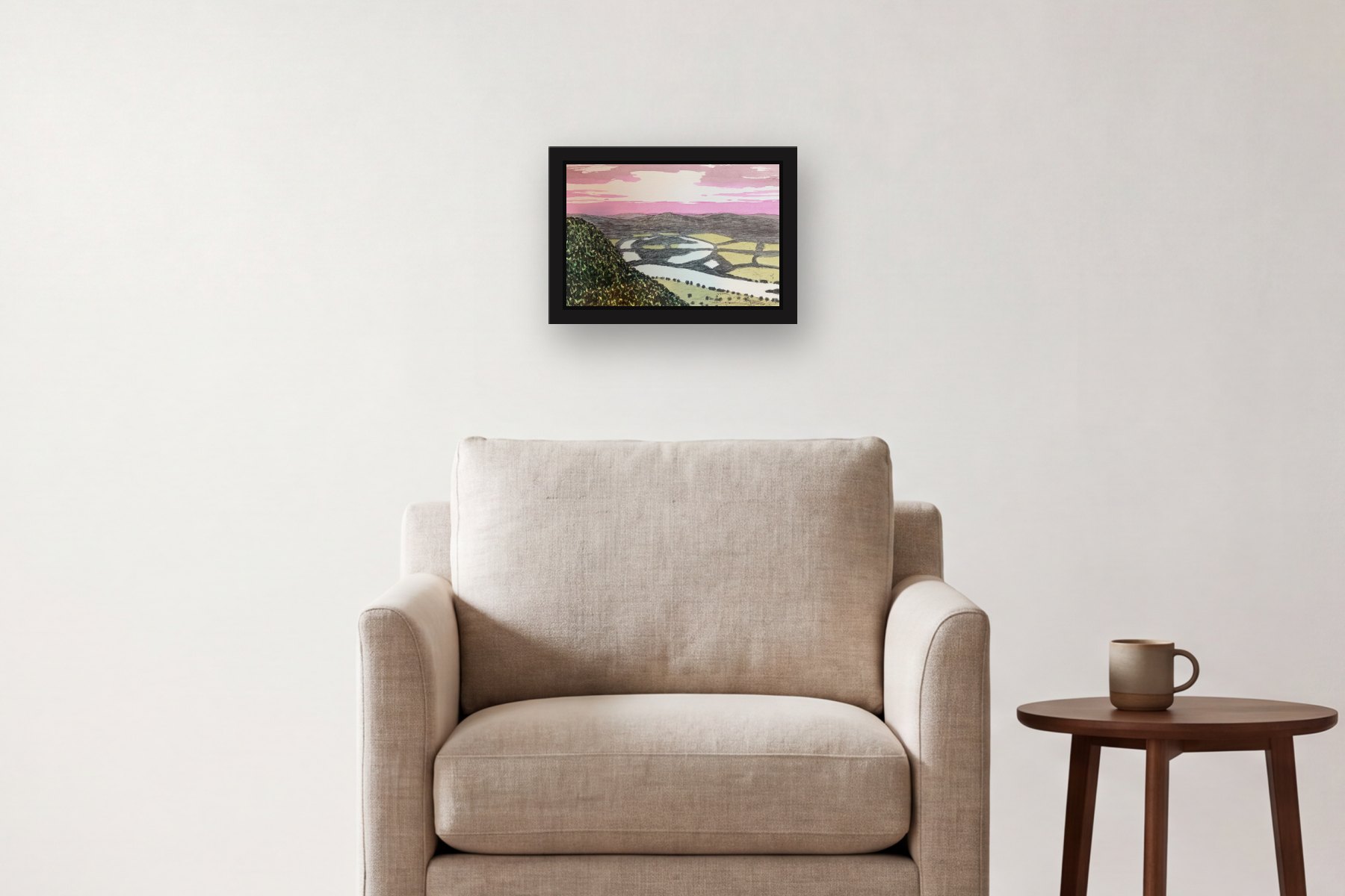 The Oxbow, 2/25 by Bill Sullivan, hanging above an armchair