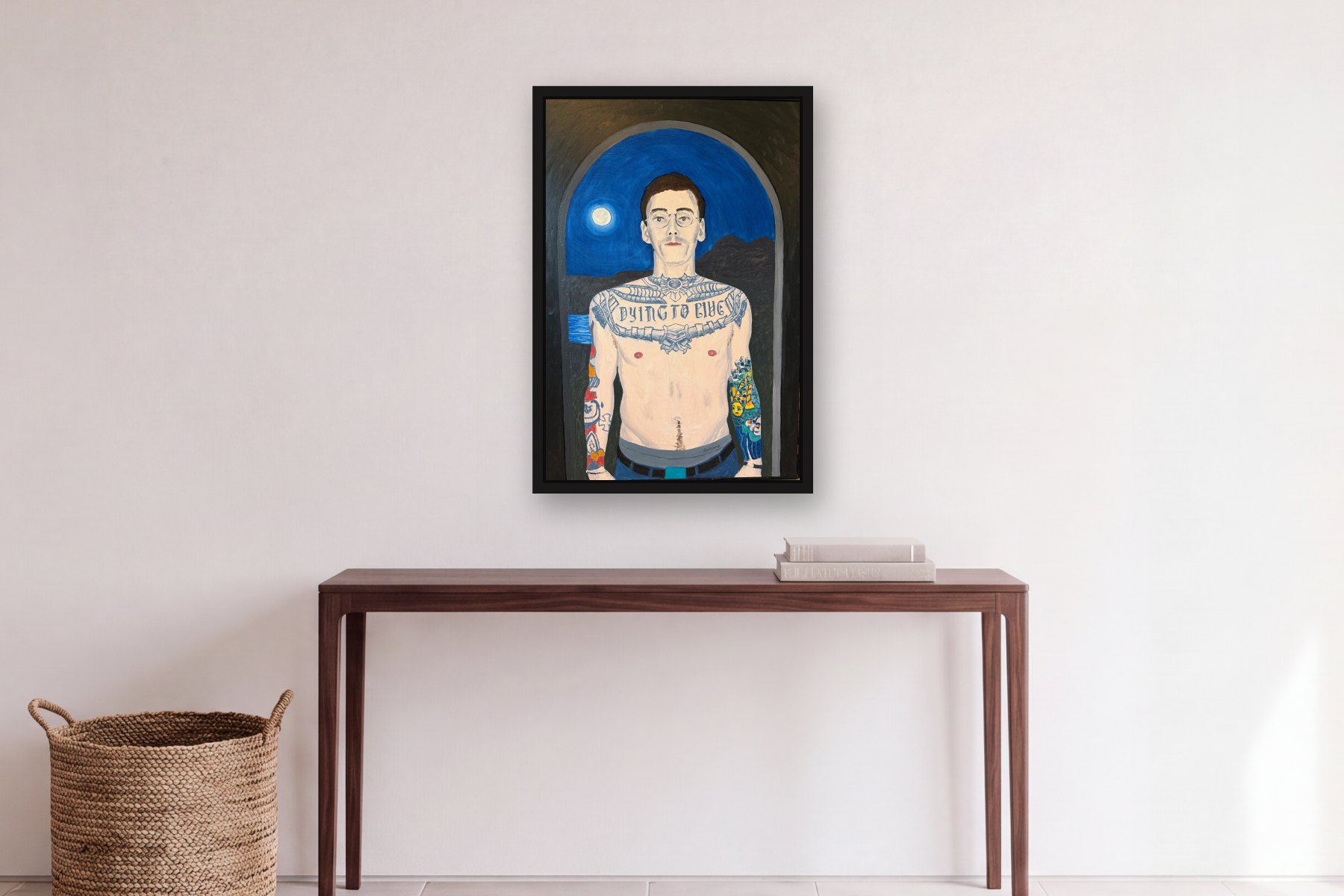 Dying to Live by Bill Sullivan, hanging above a console table in a hallway