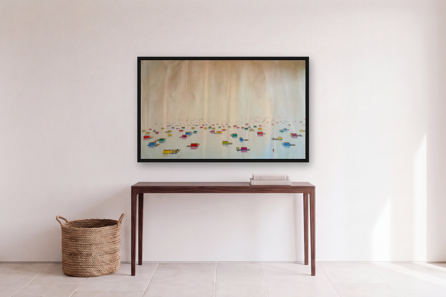 Floating Village by Bill Sullivan, hanging above a console table in a hallway