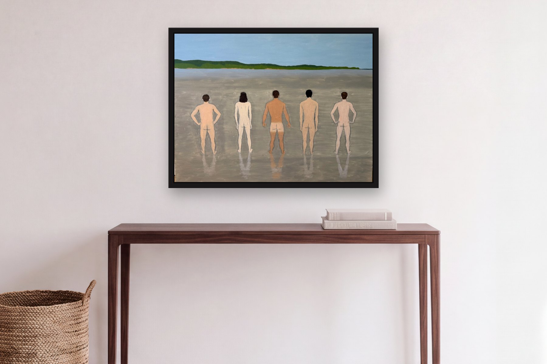 Men on the Beach by Bill Sullivan, hanging above a console table in a hallway