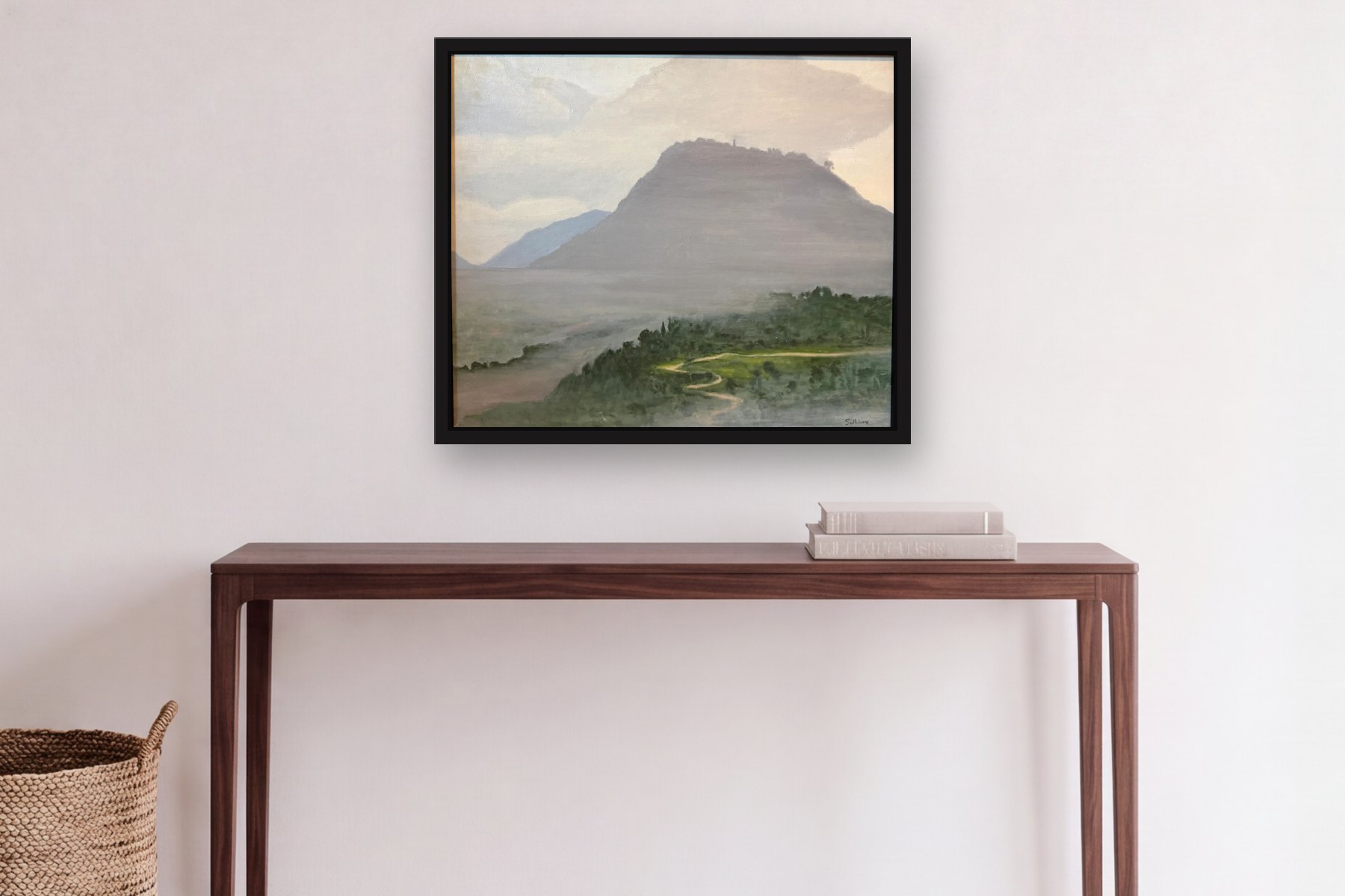 Monserrate 1978 Framed by Bill Sullivan, hanging above a console table in a hallway