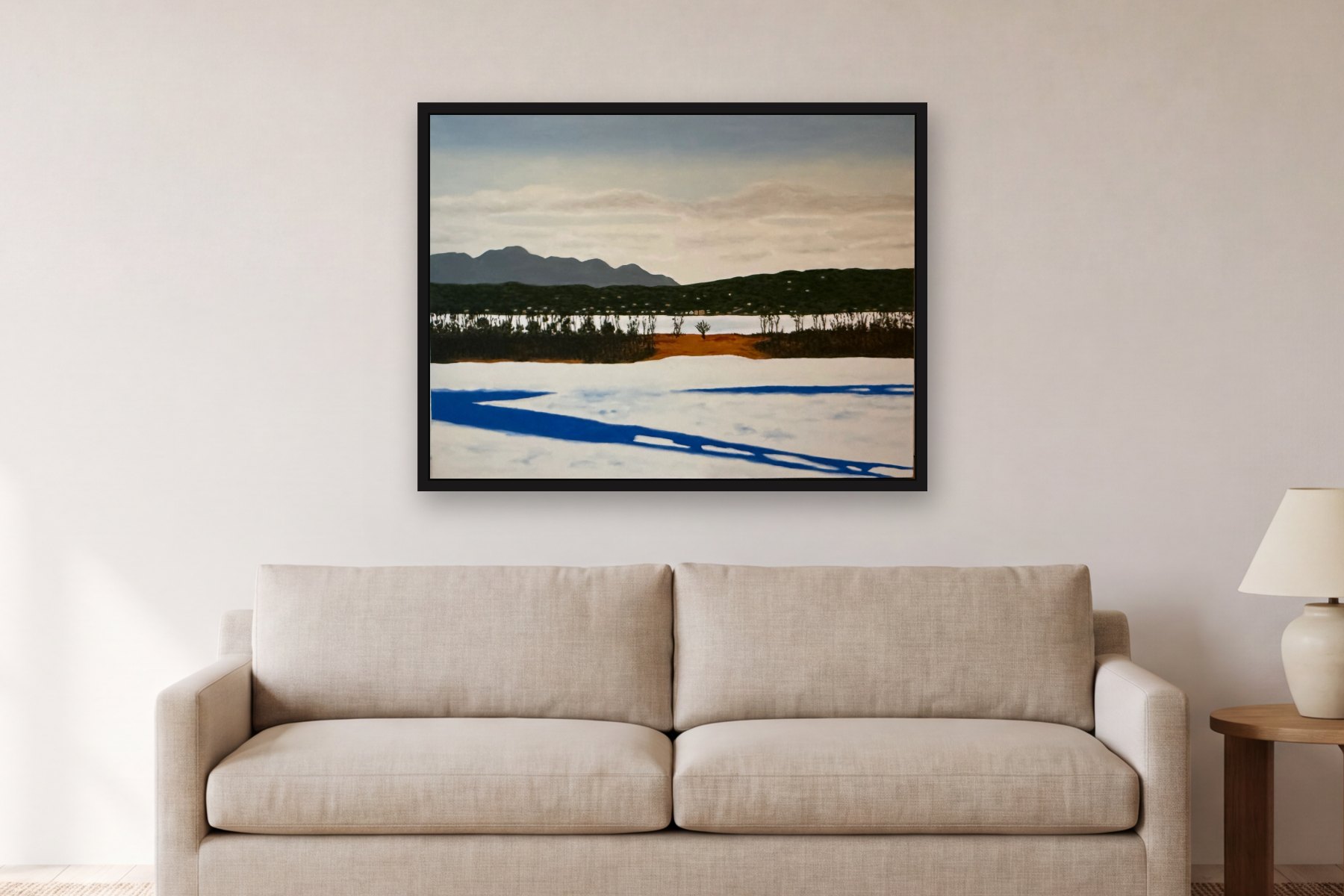 Athens from Hudson in Winter by Bill Sullivan, hanging above a sofa in a living room