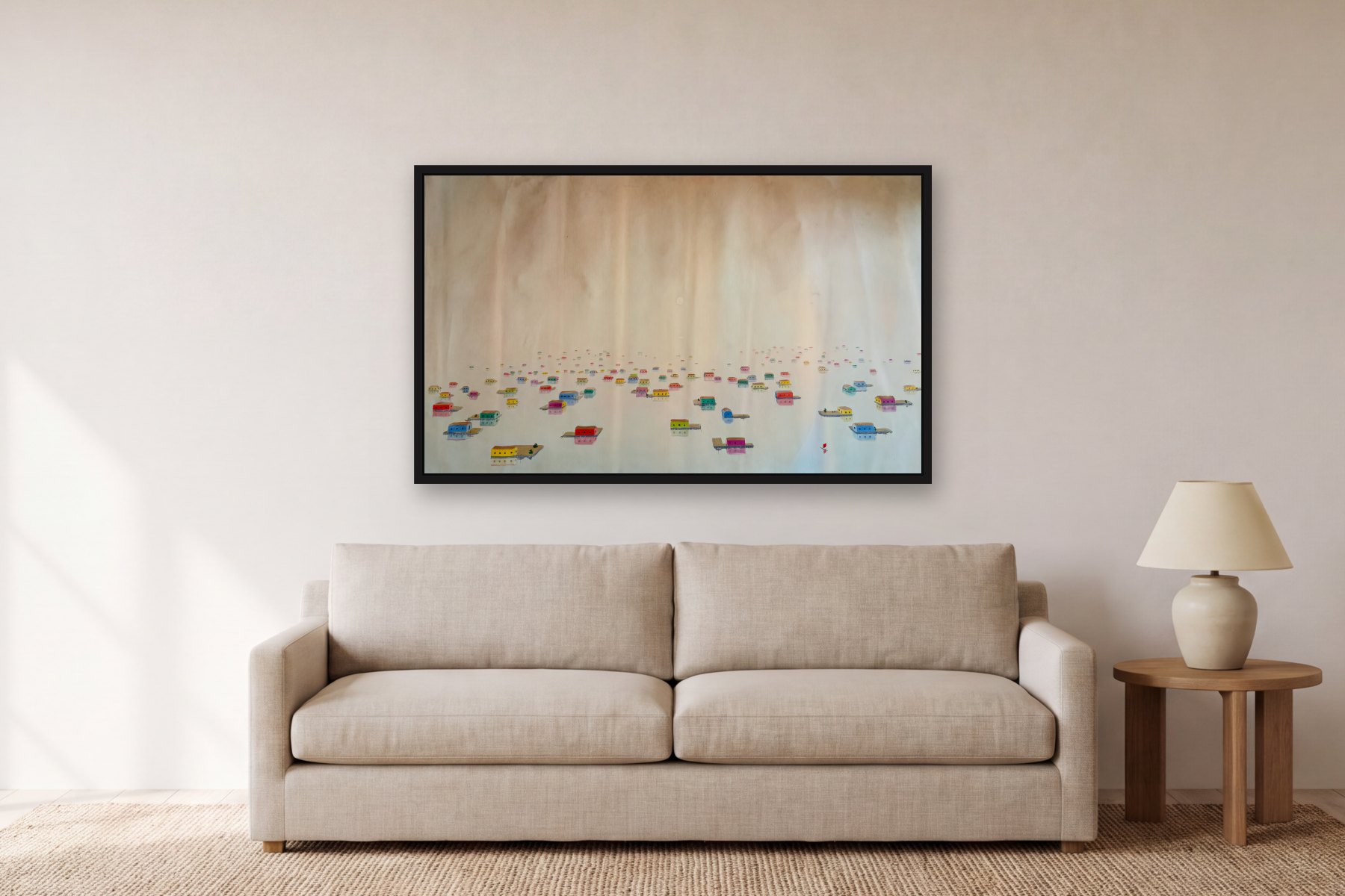 Floating Village by Bill Sullivan, hanging above a sofa in a living room