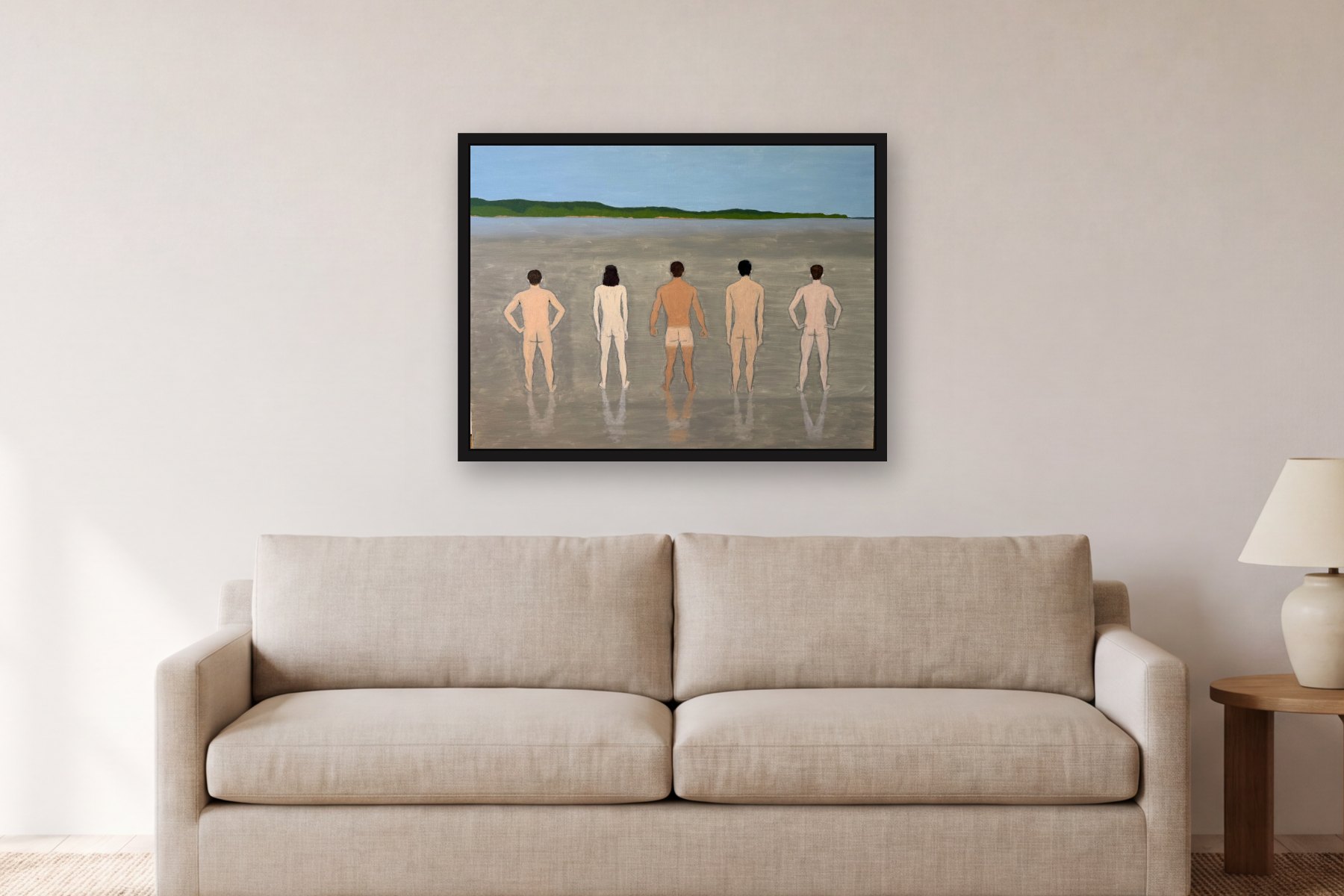 Men on the Beach by Bill Sullivan, hanging above a sofa in a living room