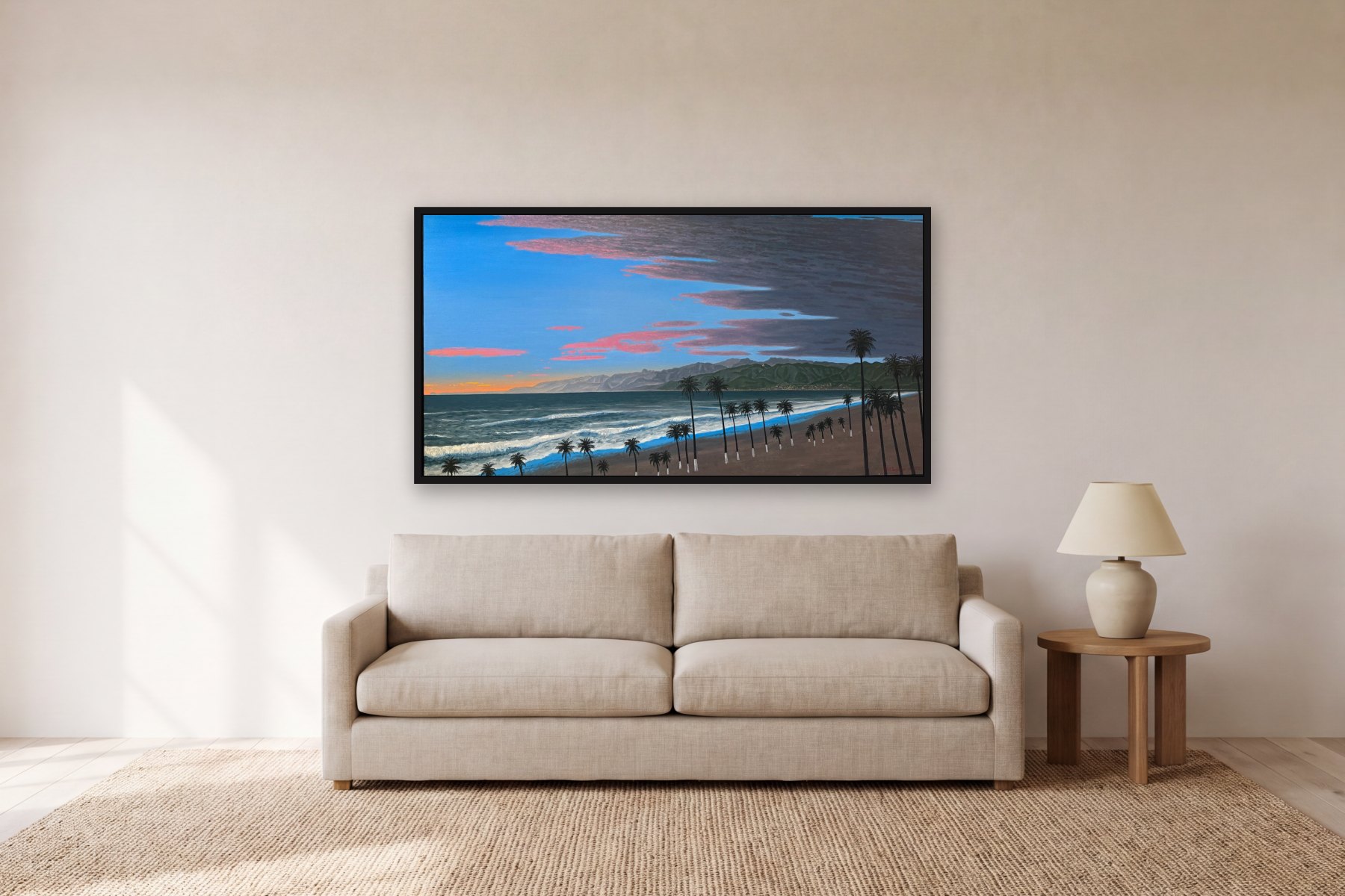 Santa Monica Bay from Venice by Bill Sullivan, hanging above a sofa in a living room