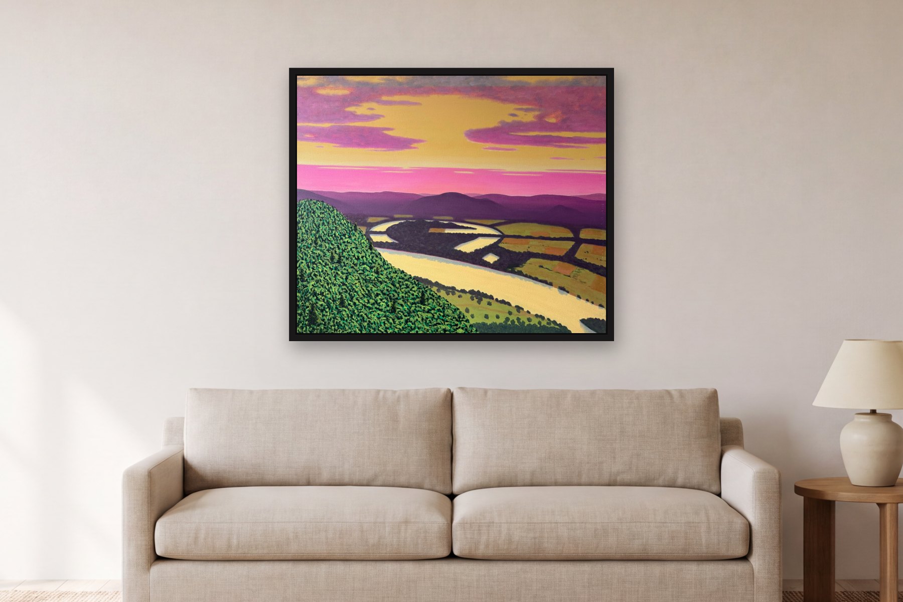 The Oxbow by Bill Sullivan, hanging above a sofa in a living room
