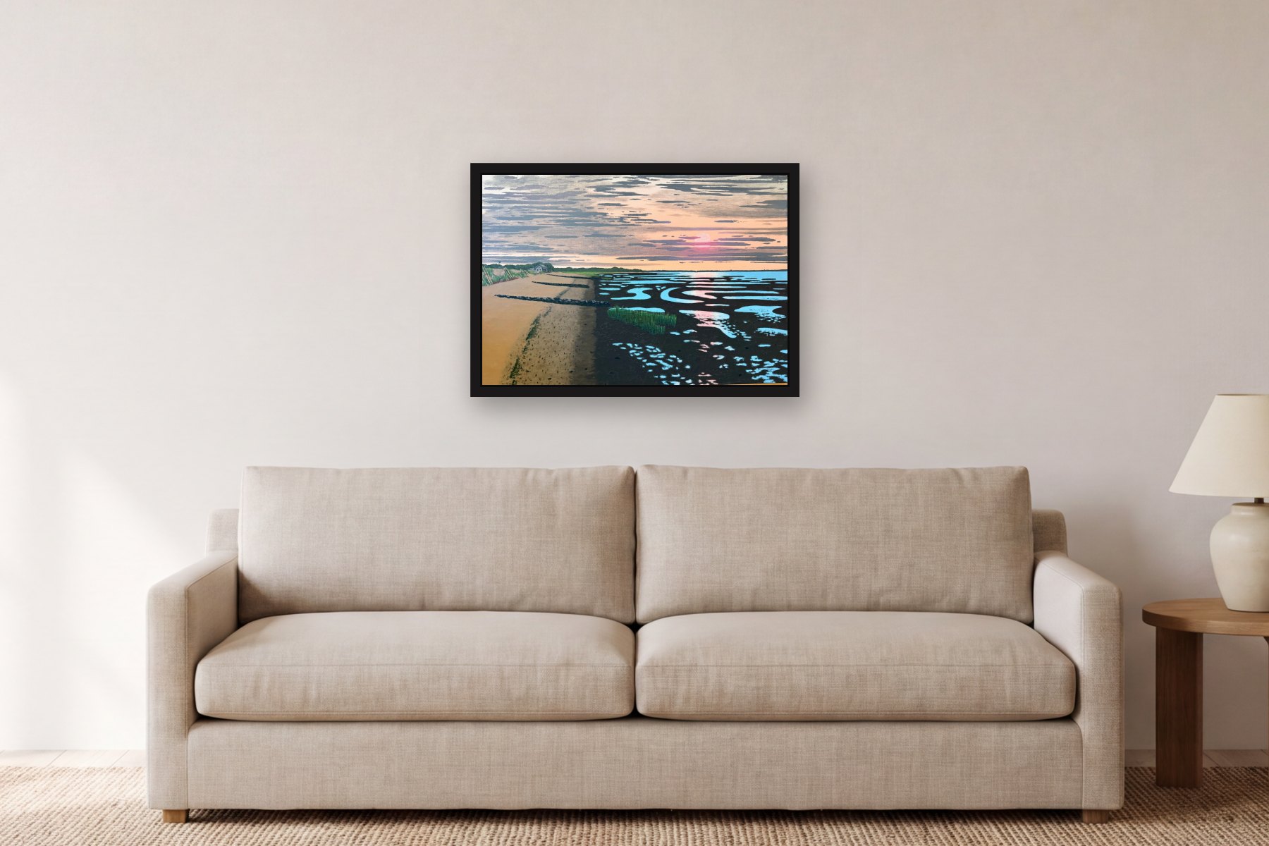 Low Tide at Sunset by Bill Sullivan, hanging above a sofa in a living room
