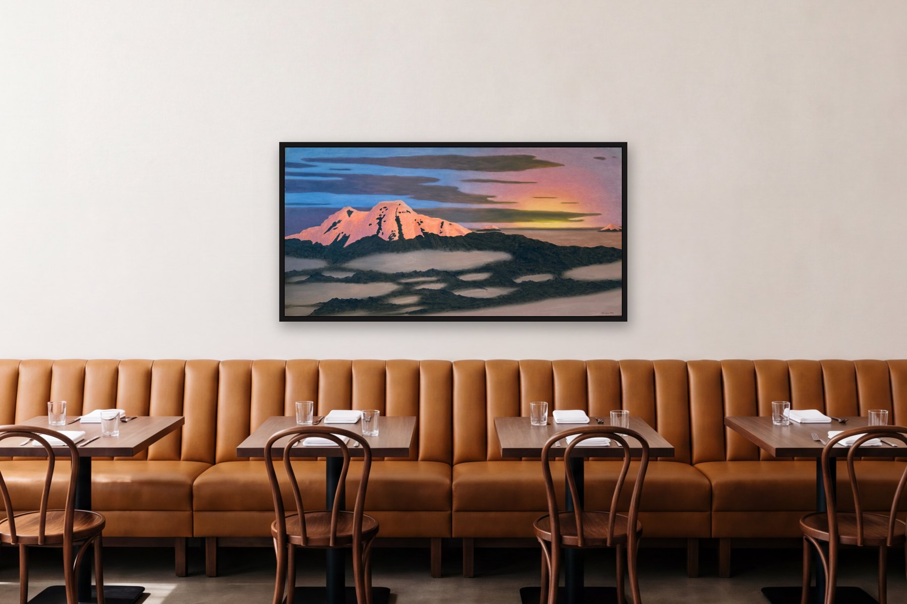 Cayambe by Bill Sullivan, hanging above a banquette in a restaurant