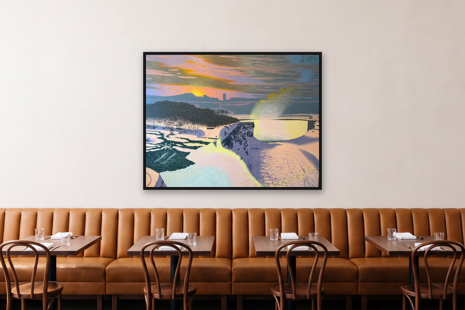 Niagara Sunset by Bill Sullivan, hanging above a banquette in a restaurant