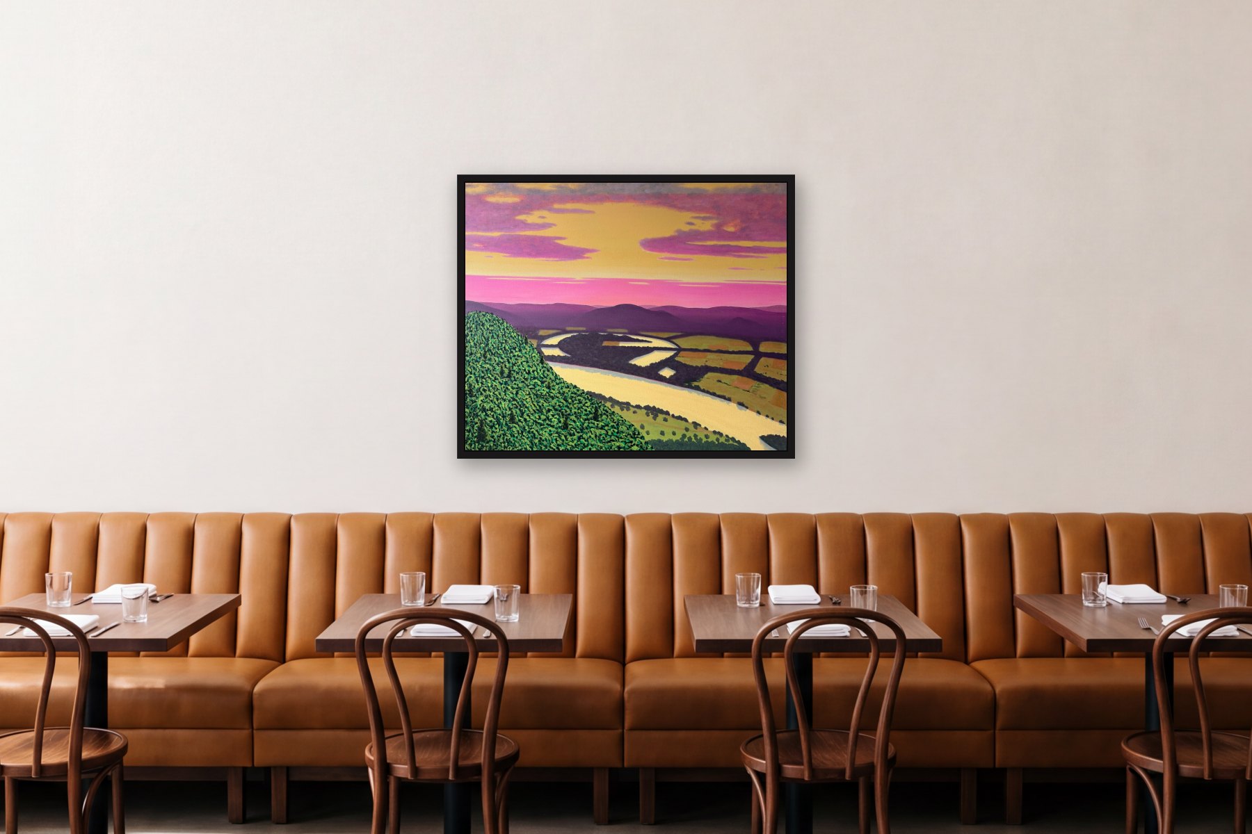 The Oxbow by Bill Sullivan, hanging above a banquette in a restaurant